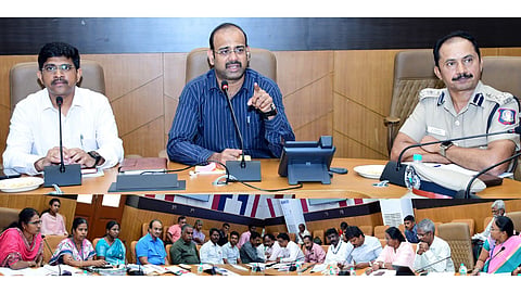 GCC Commissioner GS Sameeran flanked by senior officials at the review meeting held at Ripon Building on October 13.