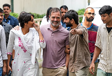 Congress leader Rahul Gandhi with content creator Ramit Verma, NSUI members and other protesters, who were allegedly injured amid crackdown by police in the recent protests against Chief Election Commissioner (CEC) Gyanesh Kumar, arrive to address a press conference after their meeting, in New Delhi, Wednesday, Oct. 14, 2026