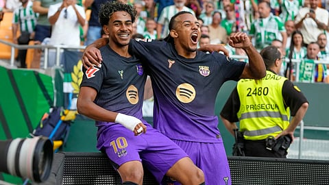 Lamine Yamal (L), Jules Kounde (R)