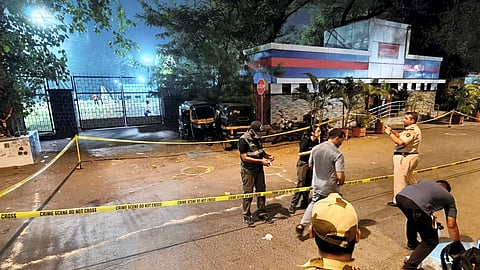 A bullet shell casing is encircled on a road amid an investigation conducted by the police and forensic officials at the crime scene where gunmen opened fire at Bollywood actor Tiger Shroff, near Pushpa Park under Juhu police station, in Mumbai, Maharashtra, Sunday, Oct. 18, 2026