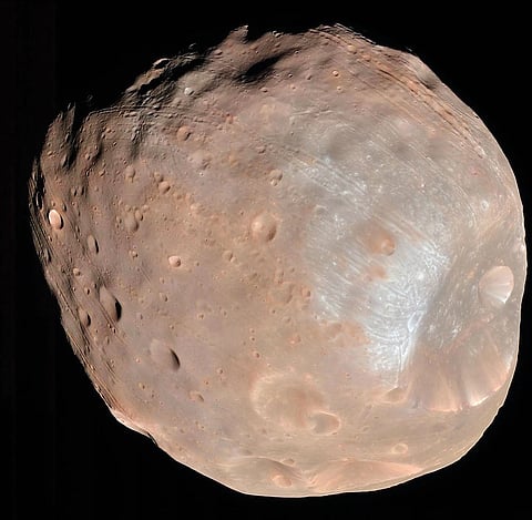  An H3 rocket lifts off from the Tanegashima Space Centre in Japan; (above) a shot of Phobos taken with Mars Reconnaissance Orbiter on March 23