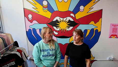 Polish abortion rights activists open a center where women can have abortions with pills, either alone or with other women, in Warsaw, Poland
