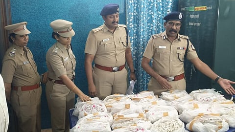 Salem Police Commissioner AG Babu with recovered silver items