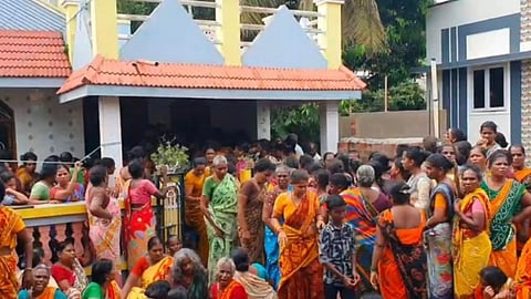 Relatives and neighbours gather in front of Jalendran's house at Sirkazhi in Mayiladuthurai on Saturday