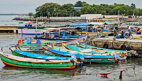 Fishing boats remain anchored at a fishing harbour following a cyclone alert, in Thoothukudi, Tamil Nadu
