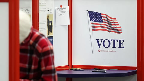 A voter fills out a ballot in the general election during early voting at the Hamilton County Board of Elections, Friday, Oct. 9, 2026, in Norwood, Ohio