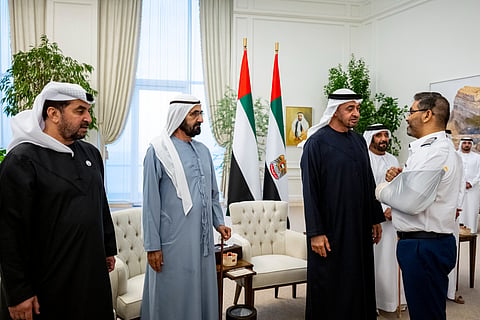  In this image posted on Oct. 28, 2026, President of the United Arab Emirates (UAE) Mohamed bin Zayed Al Nahyan, Prime Minister Mohammed bin Rashid Al Maktoum and others meet the flydubai crew members, including Indian Captain Smit Machchhar who got injured in an attack by his co-pilot on a flydubai plane, in Dubai