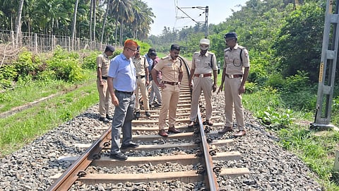 Railway police inspect track in the Ambarampalayam section on Thursday 