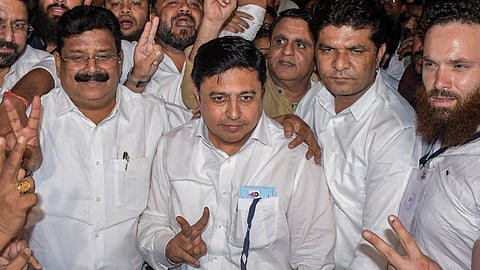Congress candidate Abhijit Wanjarri, centre, celebrates with supporters after winning from the Nagpur seat in the Maharashtra Legislative Council elections, in Nagpur, early Thursday, Oct. 29, 2026 