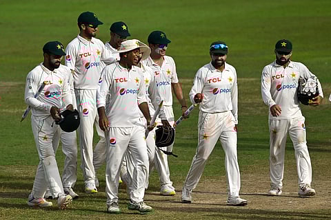 Pakistan’s cricketers celebrate their team’s win over Sri Lanka in the second Test