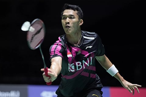 Indonesia’s Jonatan Christie returns a shot against Lakshya Sen