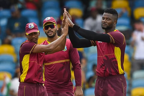 West Indies celebrates the wicket of Axar Patel