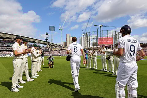 Stuart Broad is given a guard of honour by the Australian players
