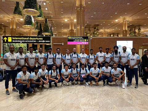 Indian men’s hockey team at the Bengaluru Airport on Tuesday