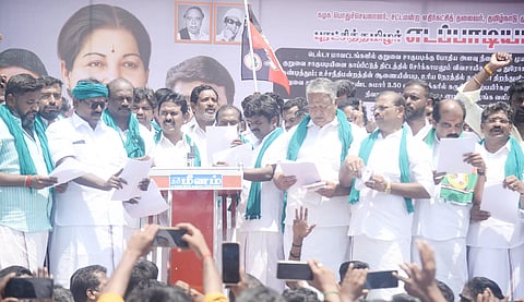 AIADMK cadre staging a protest in Thanjavur on Thursday