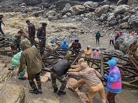 BRO personnel of Project Swastik rescue tourists from flood-affected Lachen Valley, at Chungthang