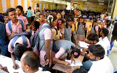 Students signing up to join oration, essay competitions to mark Kalaignar Centenary Celebrations in Vellore on Thursday