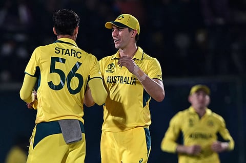 Pat Cummins and Mitchell Starc celebrate their win