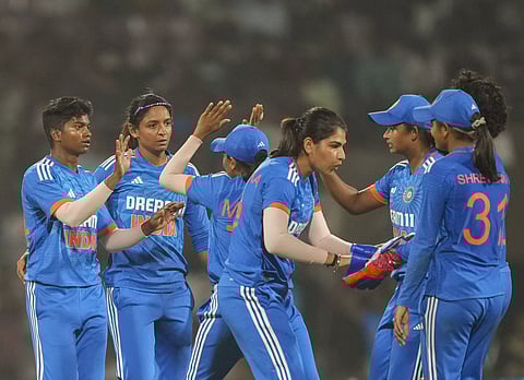 India’s Pooja Vastrakar celebrates a wicket with teammates during second T20I match