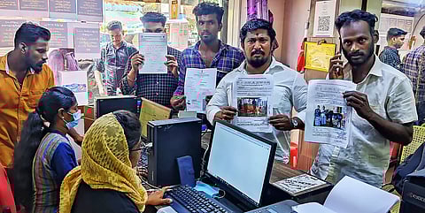 Bull owners and tamers swarm e-sevai centre for online  registration in Madurai on Wednesday