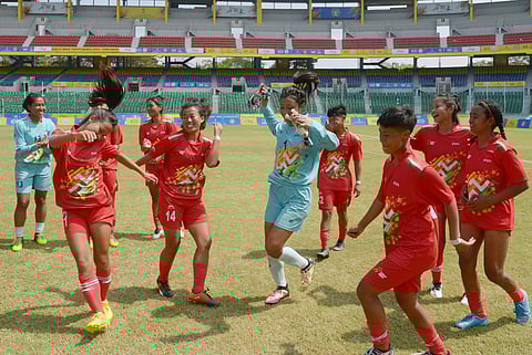 Joyous Manipur players dance after their victory against West Bengal