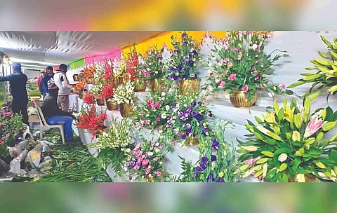 Workers readying a flower display at Bryant Park in Kodaikanal on Thursday.
