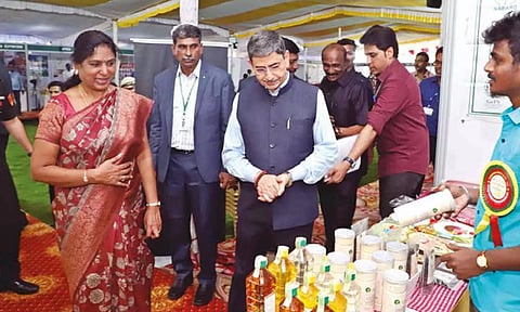 Governor RN Ravi and TNAU V-C V Geethalakshmi looking at the exhibits in Coimbatore on Friday