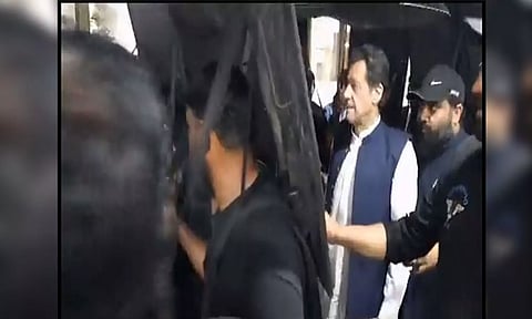 PTI chief Imran Khan on Wednesday reached Islamabad High Court amid high security. (Photo - PTI Twitter handle)