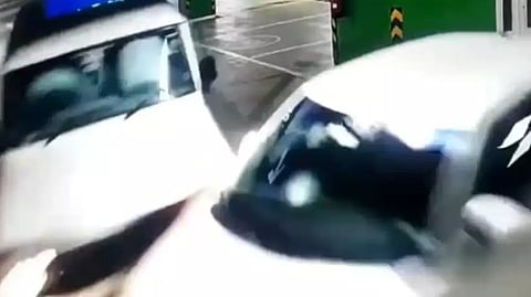 The two cars which were going towards the exit collided with each other.

