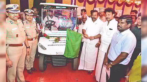 Ministers KN Nehru and Anbil Mahesh Poyyamozhi flagging off a battery operated car for those visiting Tiruchy Collectorate on Wednesday