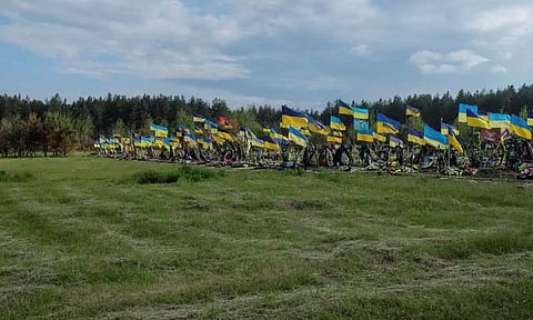 A view shows graves of Ukrainian defenders at a cemetery in Poltava
