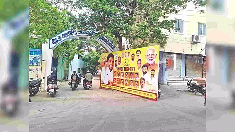 A party hoarding kept at the entrance of the Nanganallur Government Boys’ HSS
