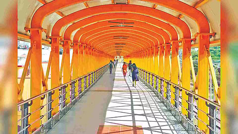 People taking a stroll on the skywalk in T Nagar