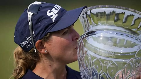 Ashleigh Buhai, of South Africa, poses with the trophy after winning the ShopRite LPGA Classic golf tournament