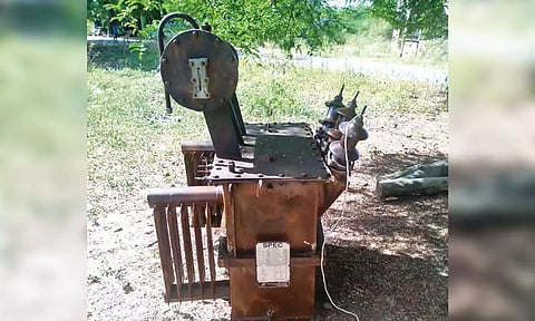 The transformer placed on a field by Tangedco linemen for safe keeping