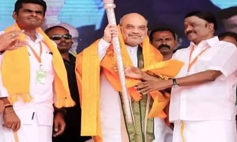 AC Shanmugam on stage with Amit Shah (Image: Twitter)