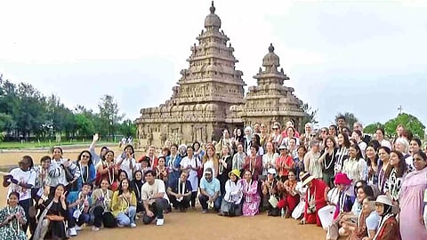 Delegates pose in front of Shore temple in Mahabalipuram