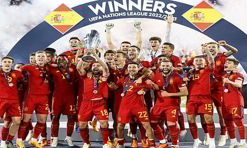 spain celebrating with the trophy