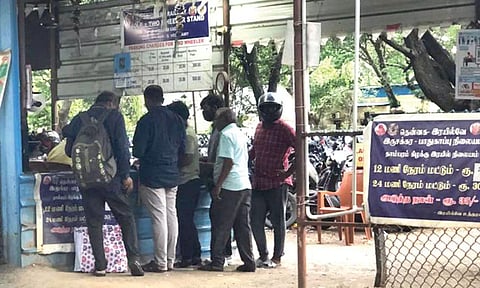 Commuters made to wait at the two-wheeler parking lot near Tambaram railway station