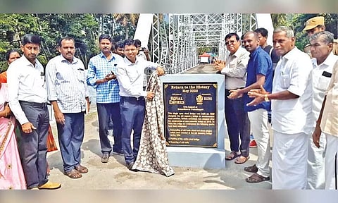 Coimbatore Collector Kranthi Kumar Pati opens the renovated suspension bridge in Kallar on Wednesday