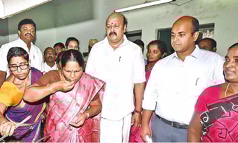 Minister Kayalvizhi Selvaraj testing the quality of food supplied in a hostel