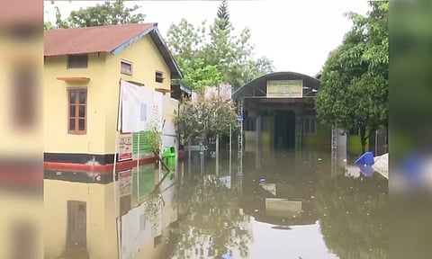 Flood waters submerge Swahid Madan Rauta Sub-Divisional Civil Hospital in Pathsala (ANI)