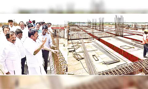 Minister KN Nehru inspecting ongoing bus terminal work in Panchapur