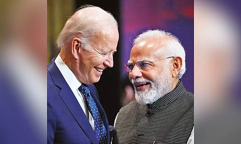 Biden with Modi.