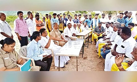 Officials of the district administration and police at peace talks meet