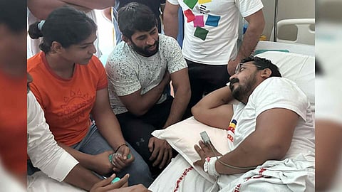 Wrestlers Sakshi Malik and Bajrang Punia with Bhim Army chief Chandra Shekhar (Photo: IANS)