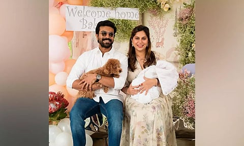 Ram Charan, Upasana Konidela with their daughter and pet dog (PHOTO: ANI)