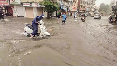 Normal life was thrown out of gear at several places in Junagadh, Jamnagar, Morbi, Kutch, Surat and Tapi districts due to heavy rains during the day, an IMD official said (Photo: PTI)