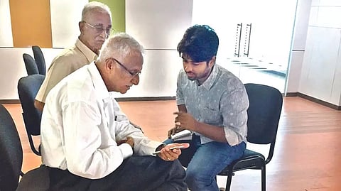 Manu (right) during a class with seniors