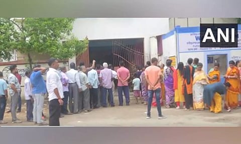 Voters line up outside a polling both to cast their votes for West Bengal Panchayat Elections (ANI)